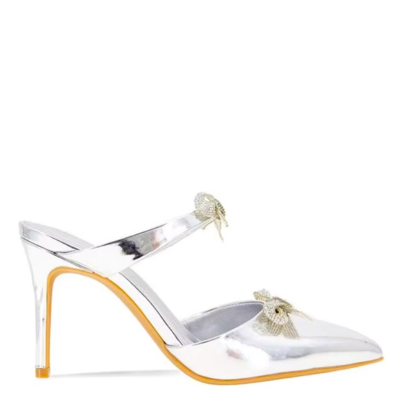 New BCBGeneration
Bardia Metallic Patent Rhinestone Bows Dress Mules - Picture 3 of 13